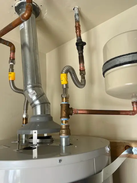 Water heater installation and plumbing repair in Grazierville